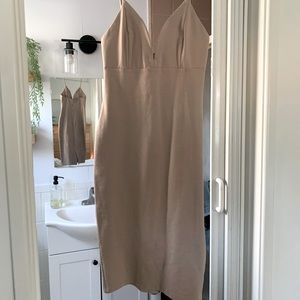 Beige medium bodycon dress.